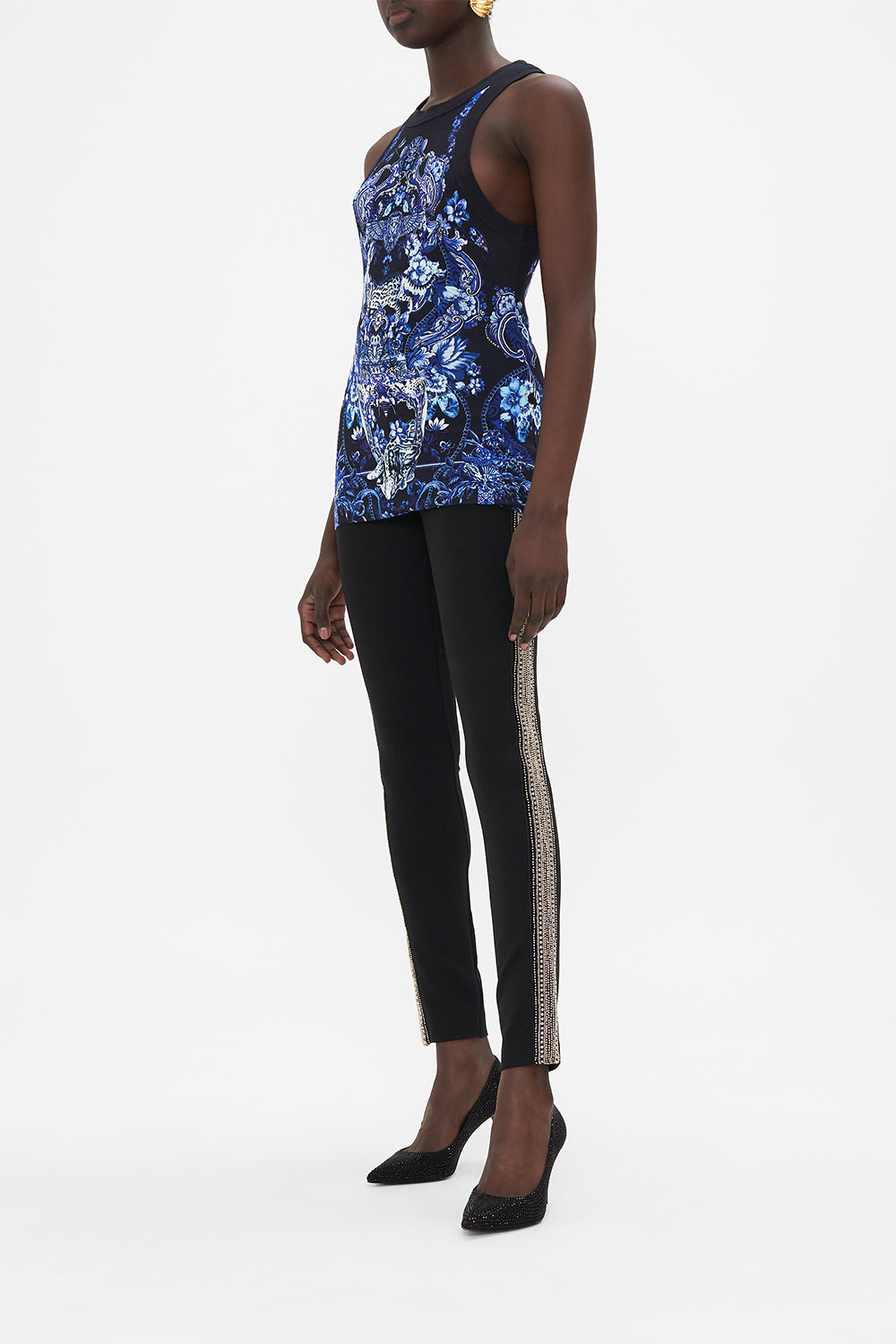 Side view of model wearing CAMILLA tank top in Delft Dynasty print