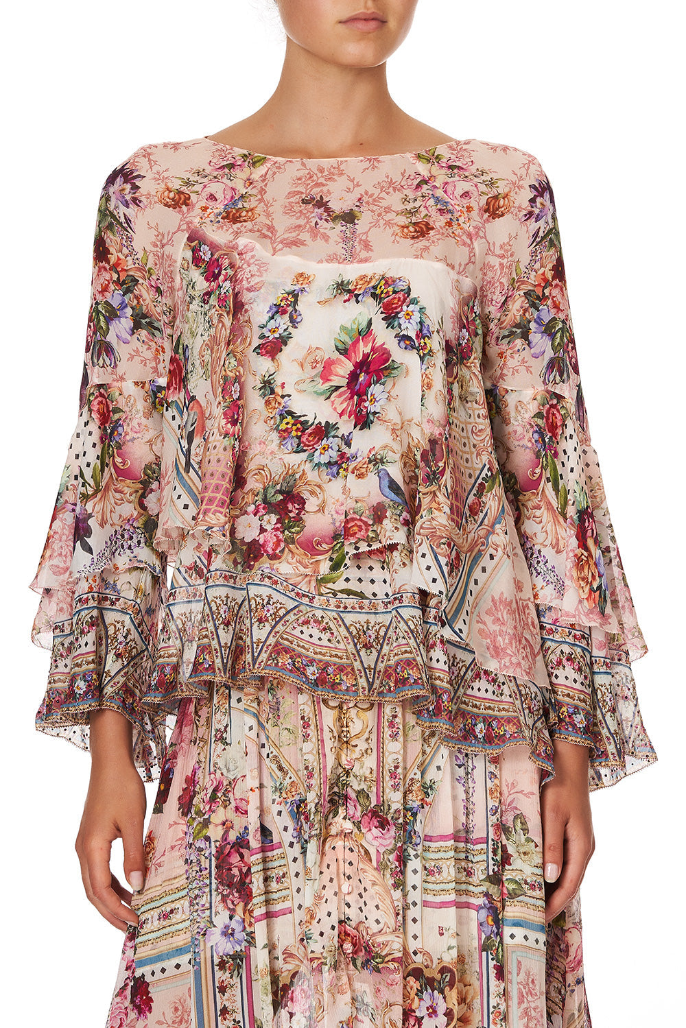 FLARED LAYERED BLOUSE SUMMONED BY A ROSE