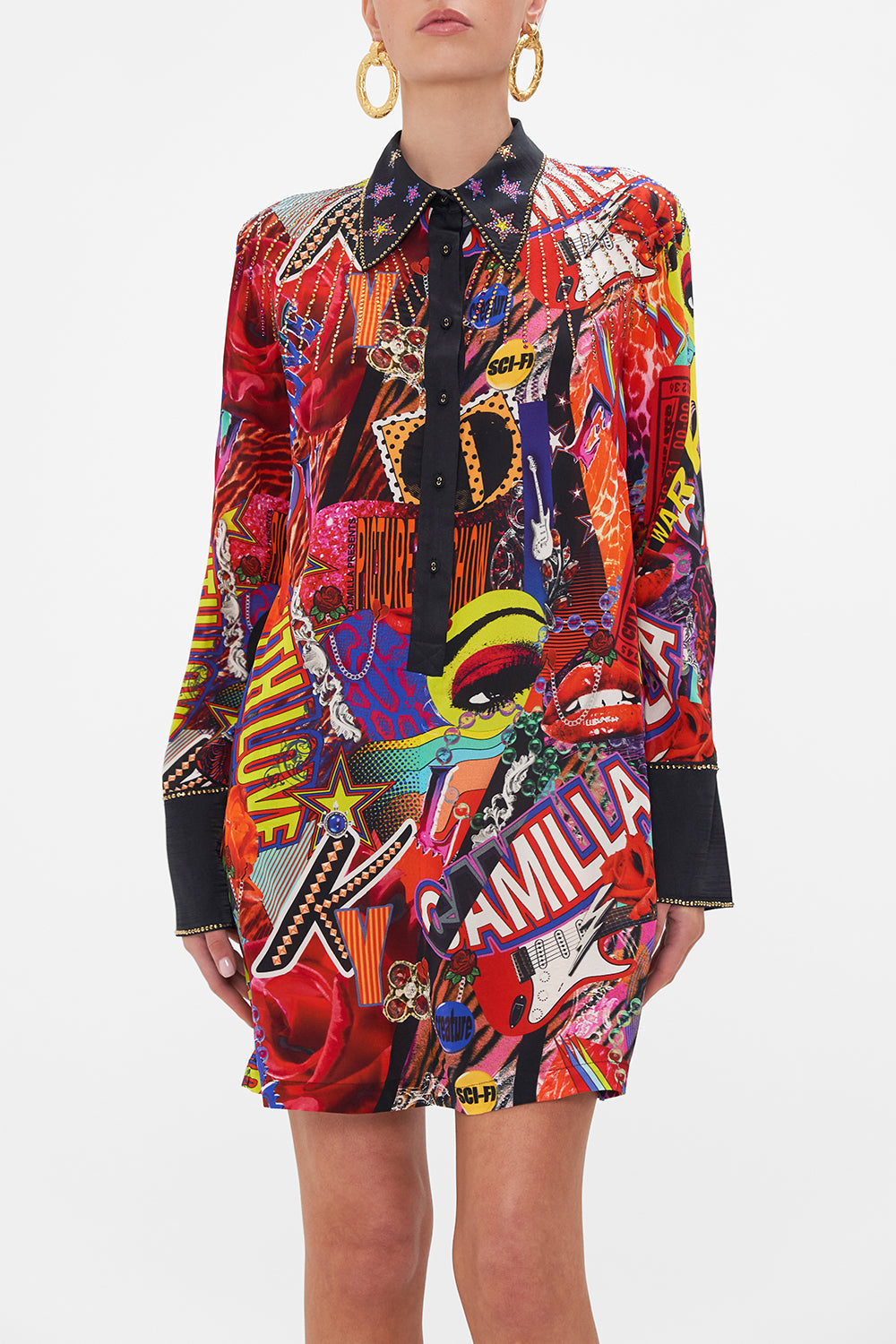 Crop view of model wearing CAMILLA silk mini shirtdress in multicoloured Radical Rebirth print