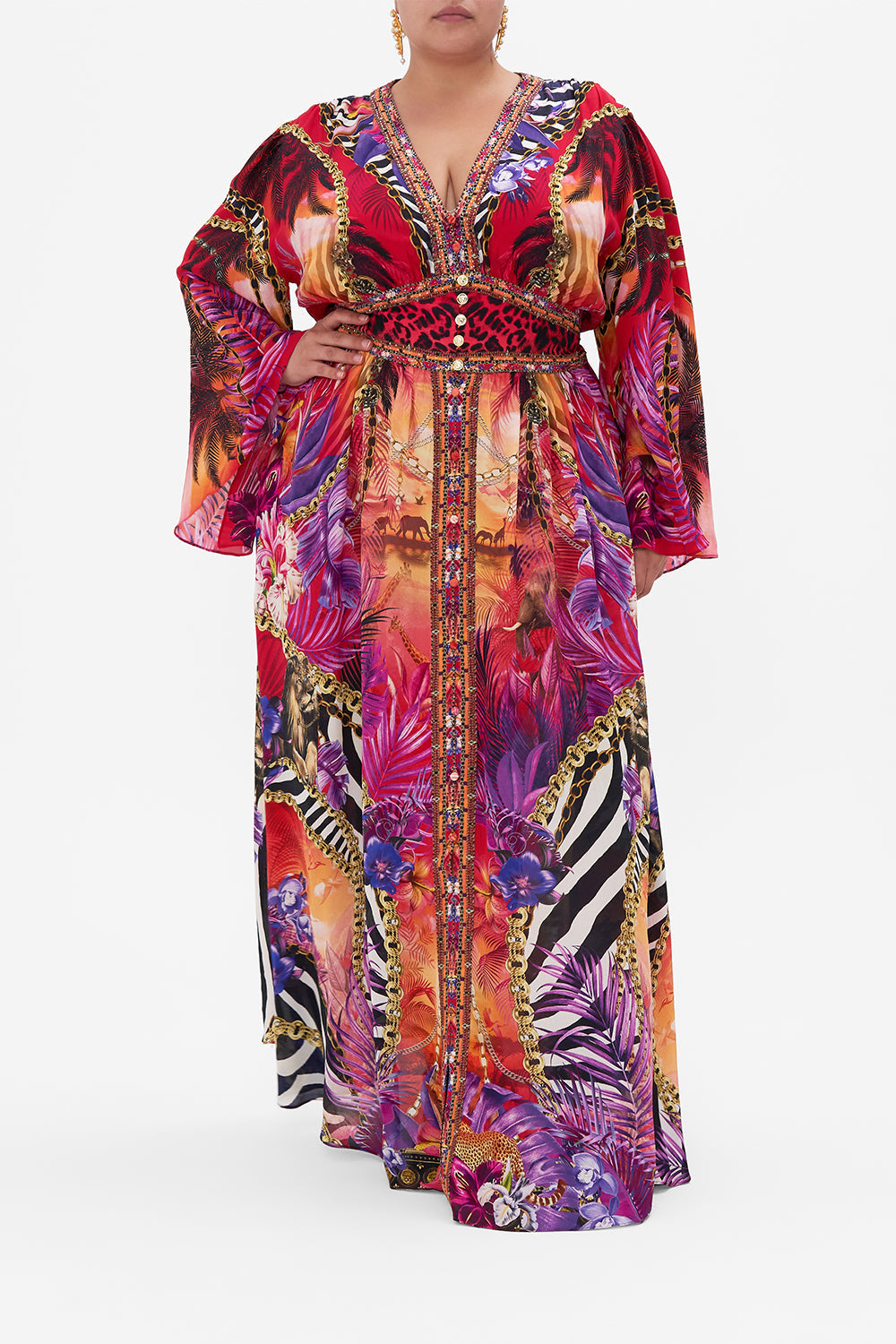 Front view of curvy model wearing CAMILLA plus size tropical print silk maxi dress in Wild Loving print