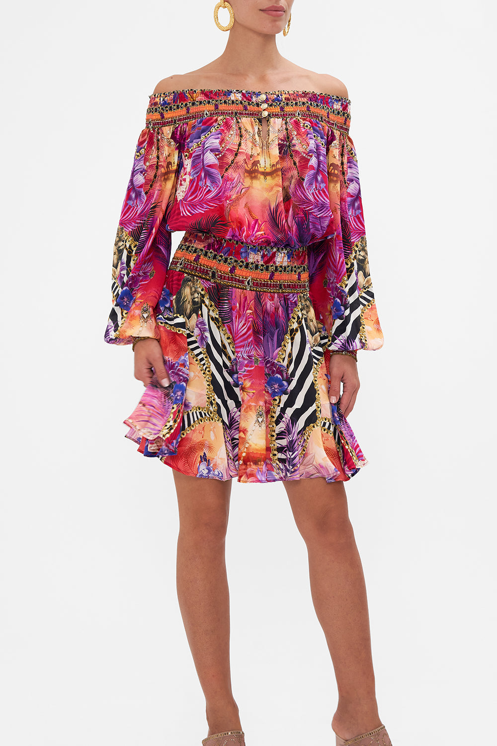 Crop view of model wearing CAMILLA silk off the shoulder dress in Wild Loving print