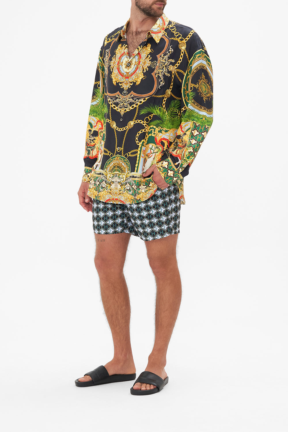 Back view of model wearing Hotel Franks by CAMILLA mens silk oversized sleeve button through shirt in Jealousy and Jewels print