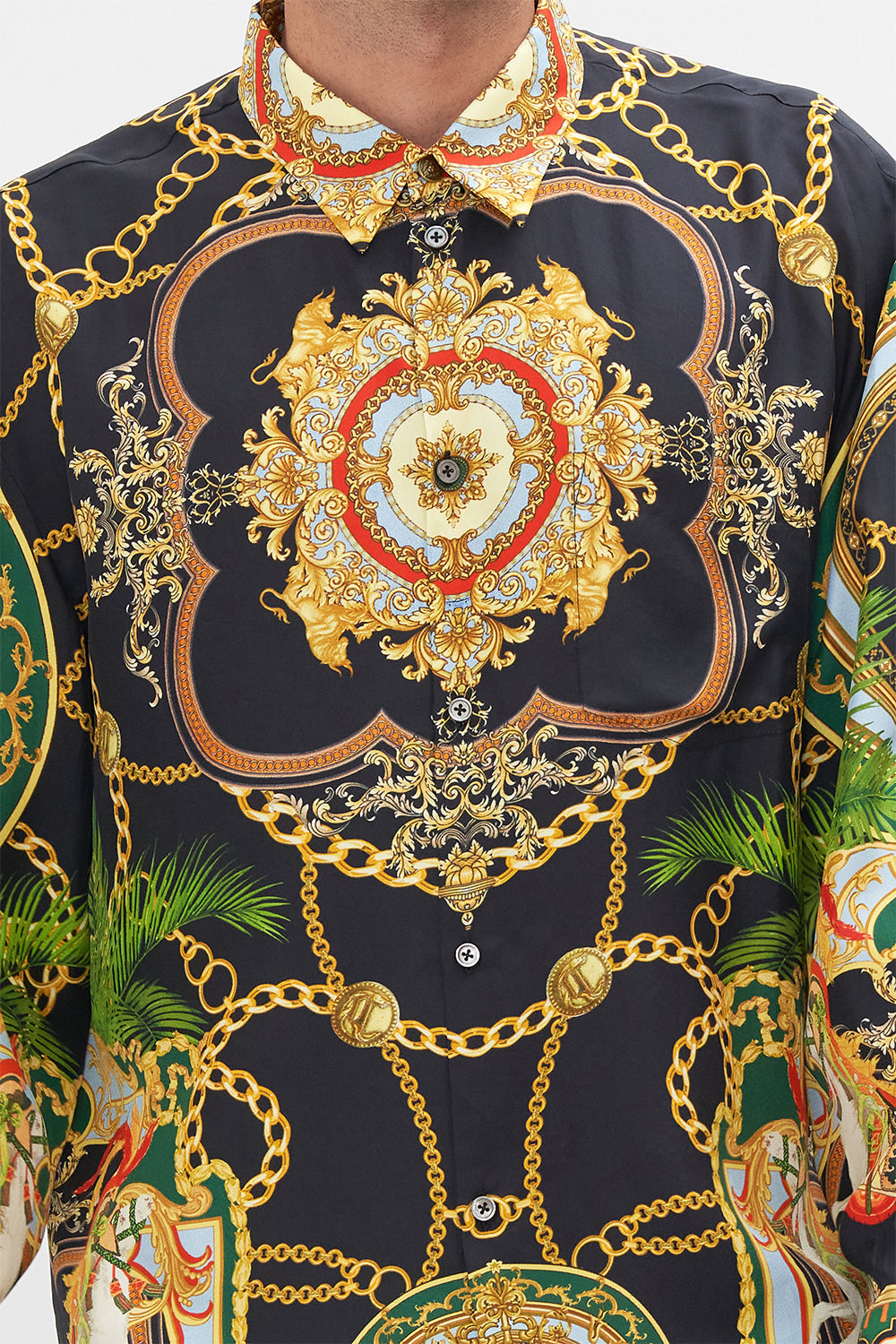 Crop view of model wearing Hotel Franks by CAMILLA mens silk oversized sleeve button through shirt in Jealousy and Jewels print