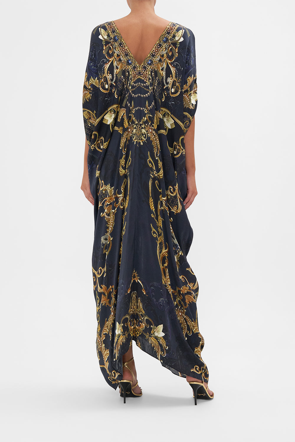 Back view of model wearing CAMILLA silk maxi dress in Moonlight Melodies print