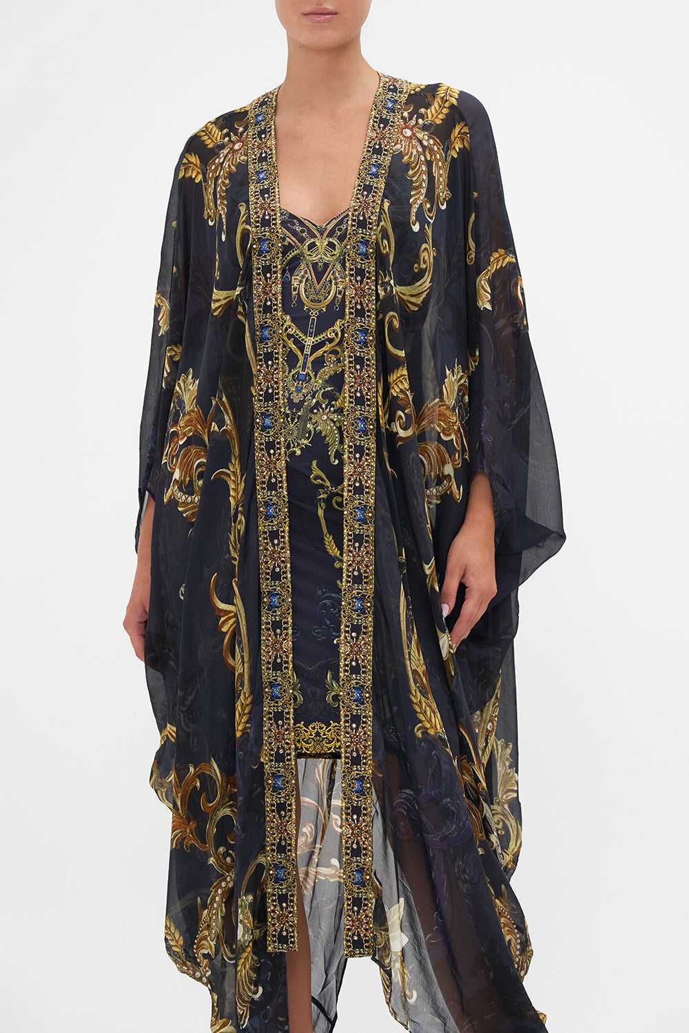 Crop view of model wearing CAMILLA silk kimono in Moonlight Melodies print