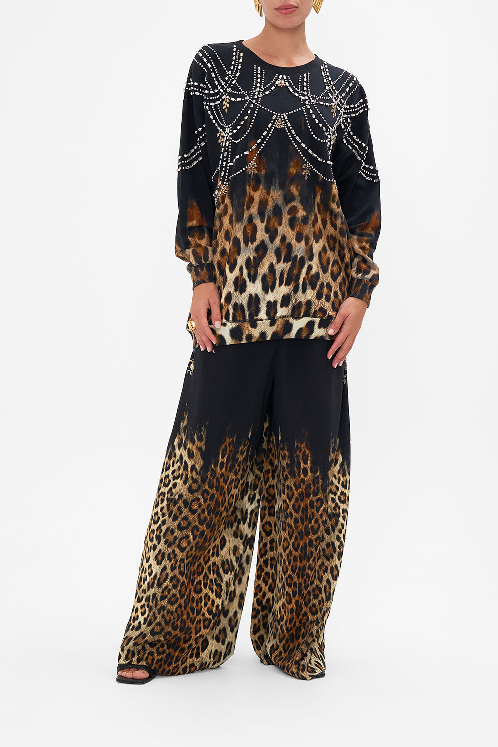 Front view of model wearing CAMILLA oversized sweater in Jungle Dreaming print