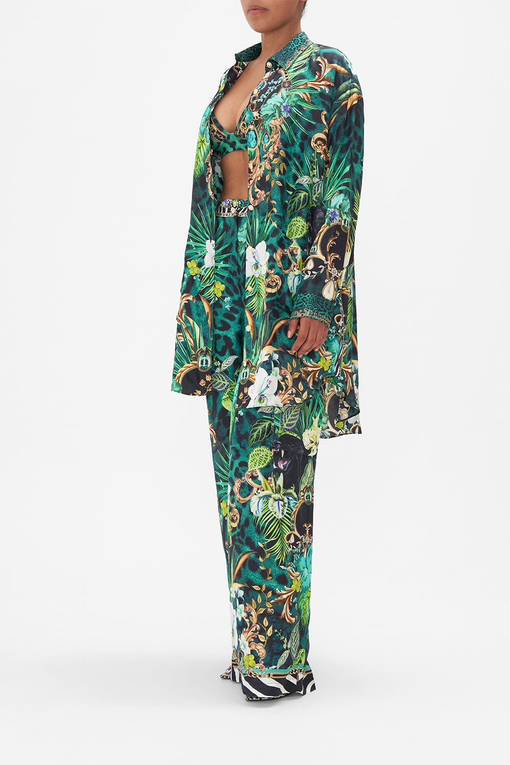 Side view of model wearing CAMILLA silk tunic dress Sing My Song print