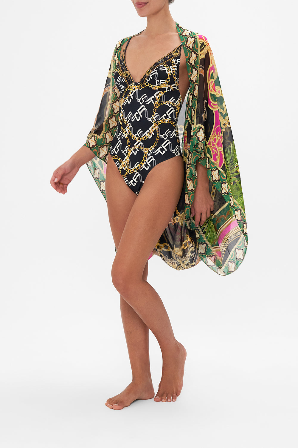 Side view of model wearing CAMILLA silk shrug in Jealousy And Jewels print