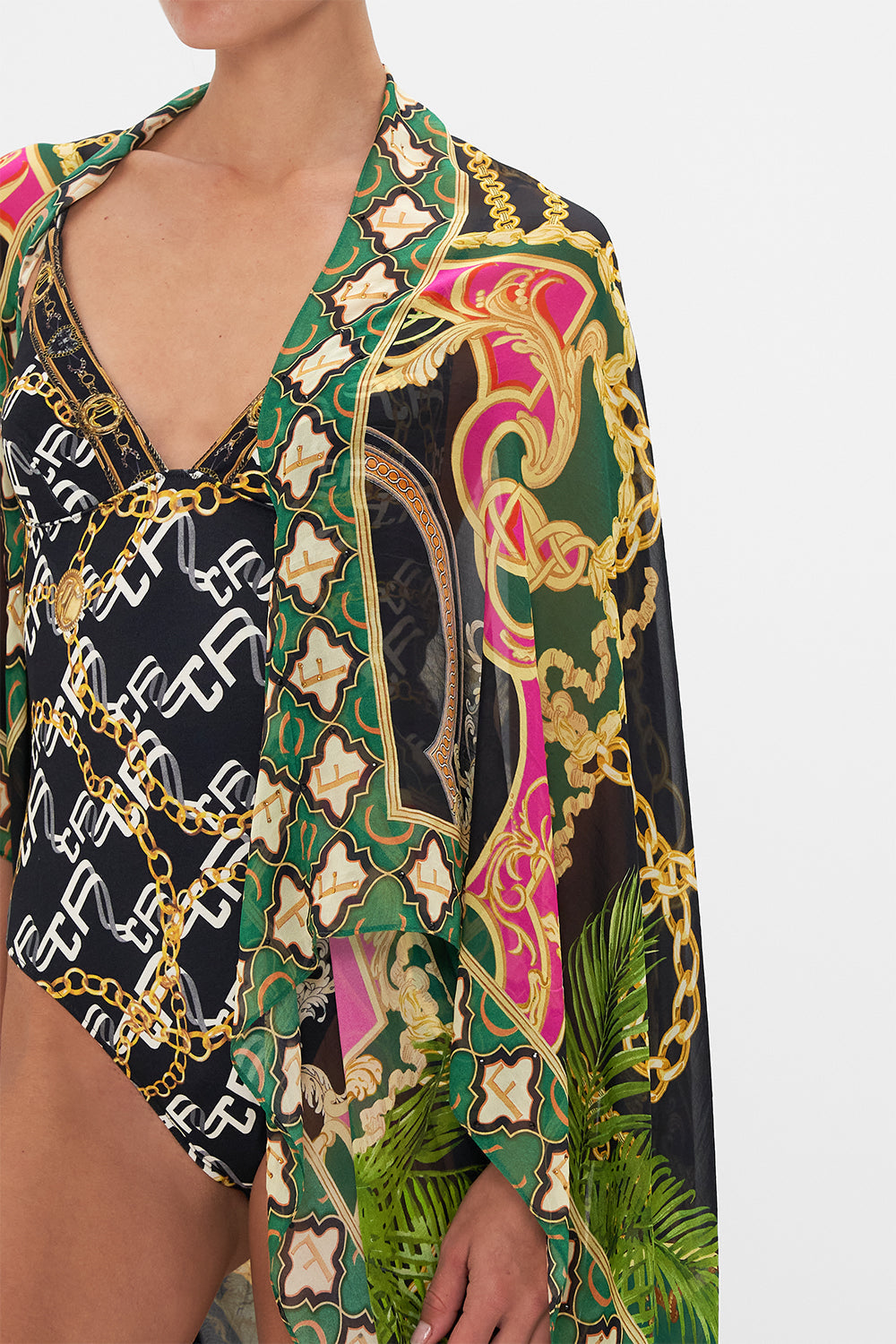 Detail view of model wearing CAMILLA silk shrug in Jealousy And Jewels print