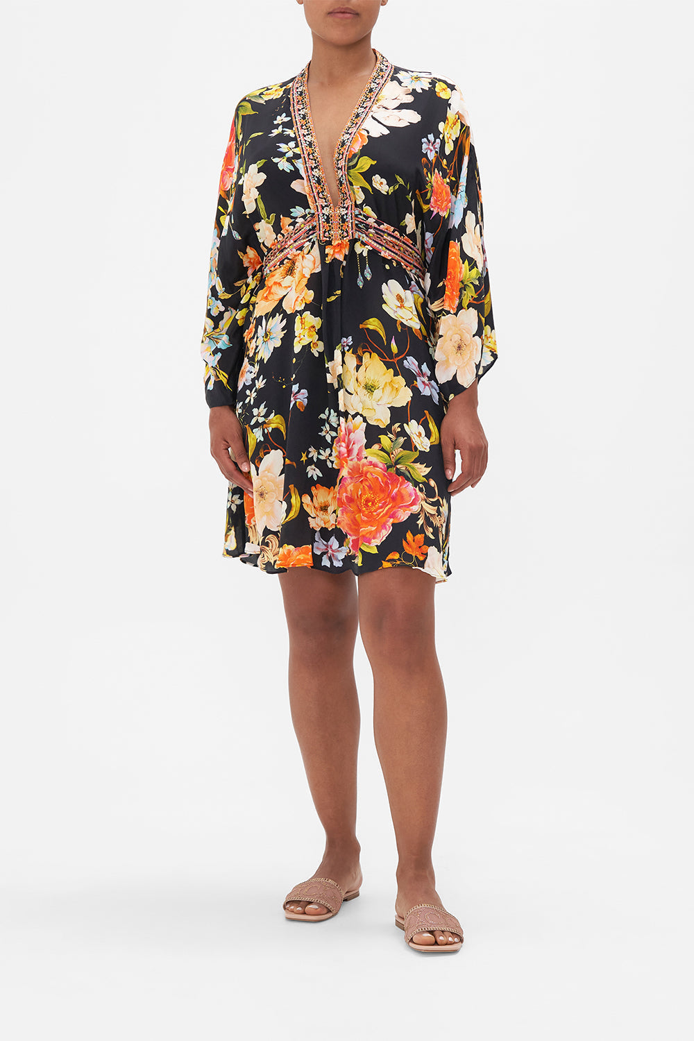 Front view of model wearing CAMILLA floral silk kaftan in Secret History print