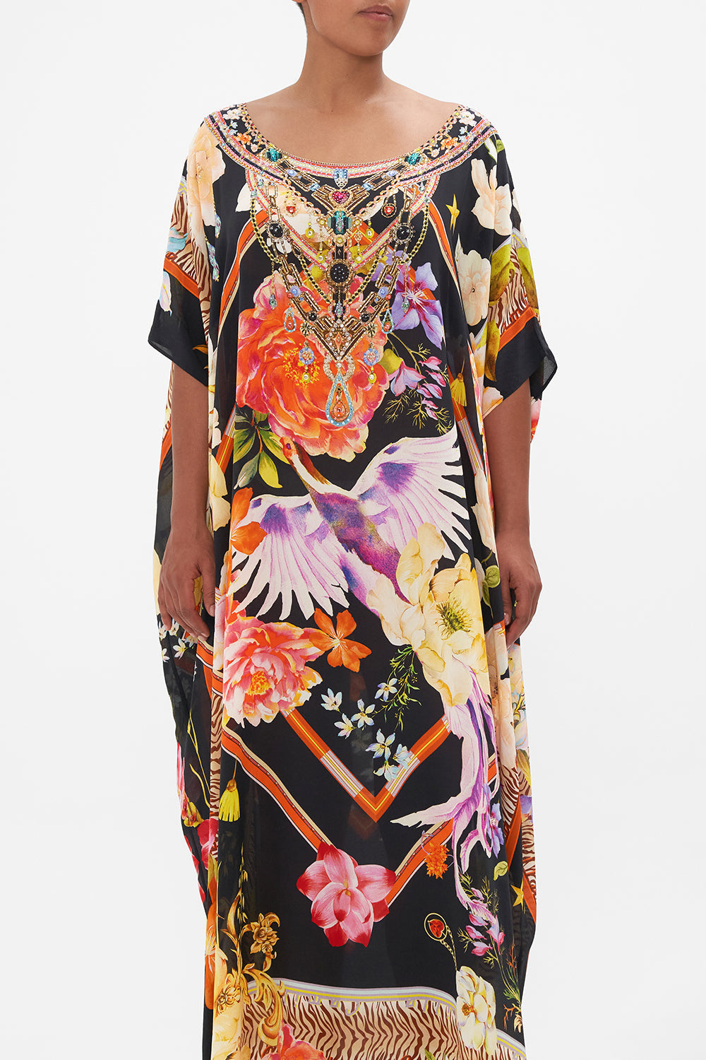 Crop view of model wearing CAMILLA silk kaftan in Secret History floral print