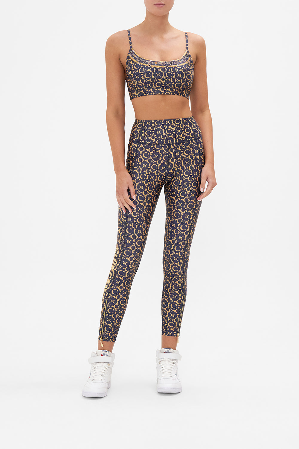 Front view of model wearing CAMILLA active crop top in Song Of The Jungle print