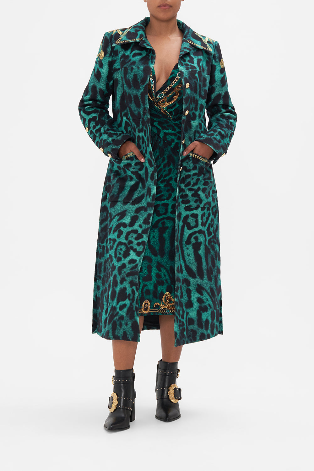Front view of model weaing CAMILLA green leopard print coat in Sing My Song print
