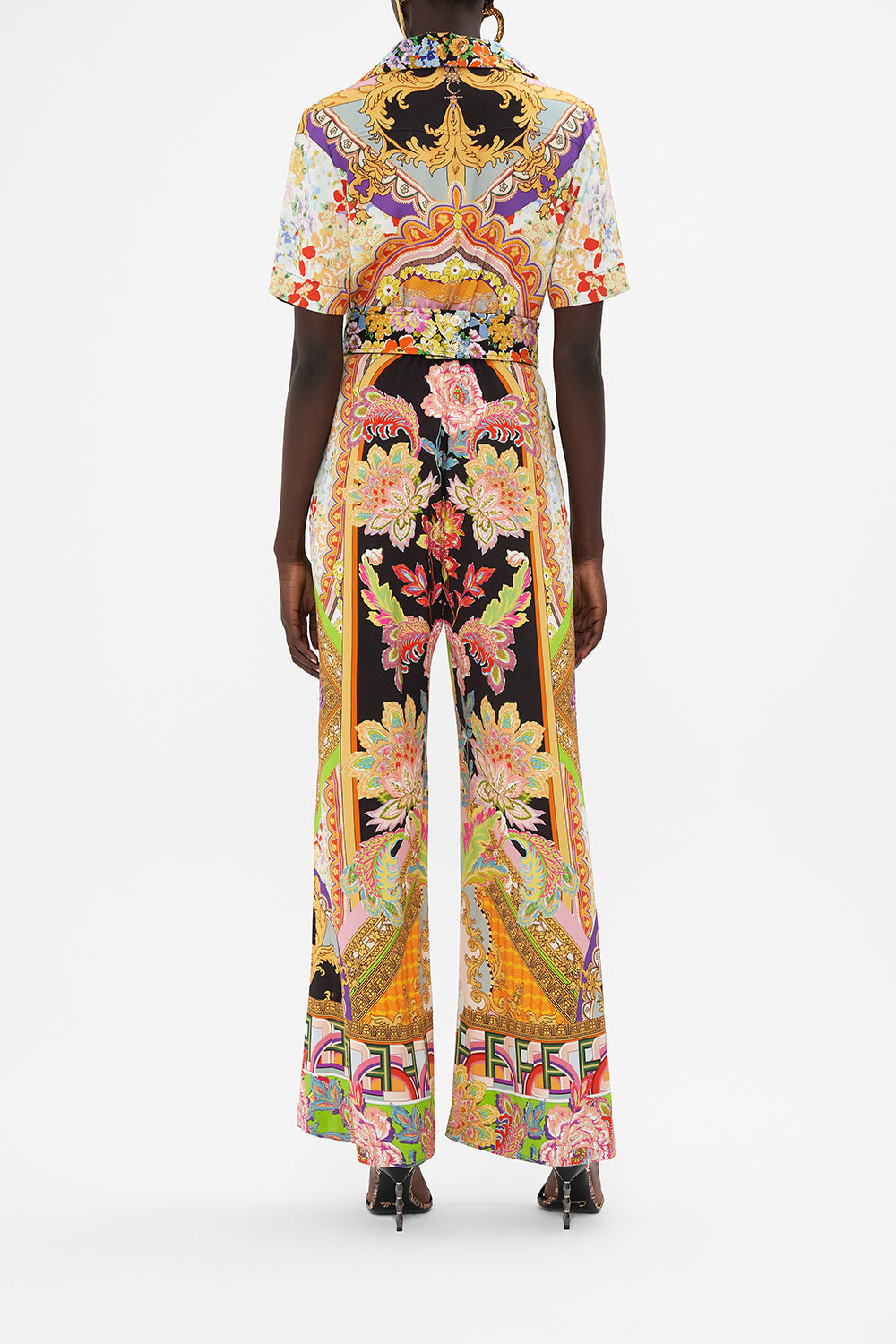 Back view of model wearing CAMILLA printed jumpsuit in Sundowners in Sicily print