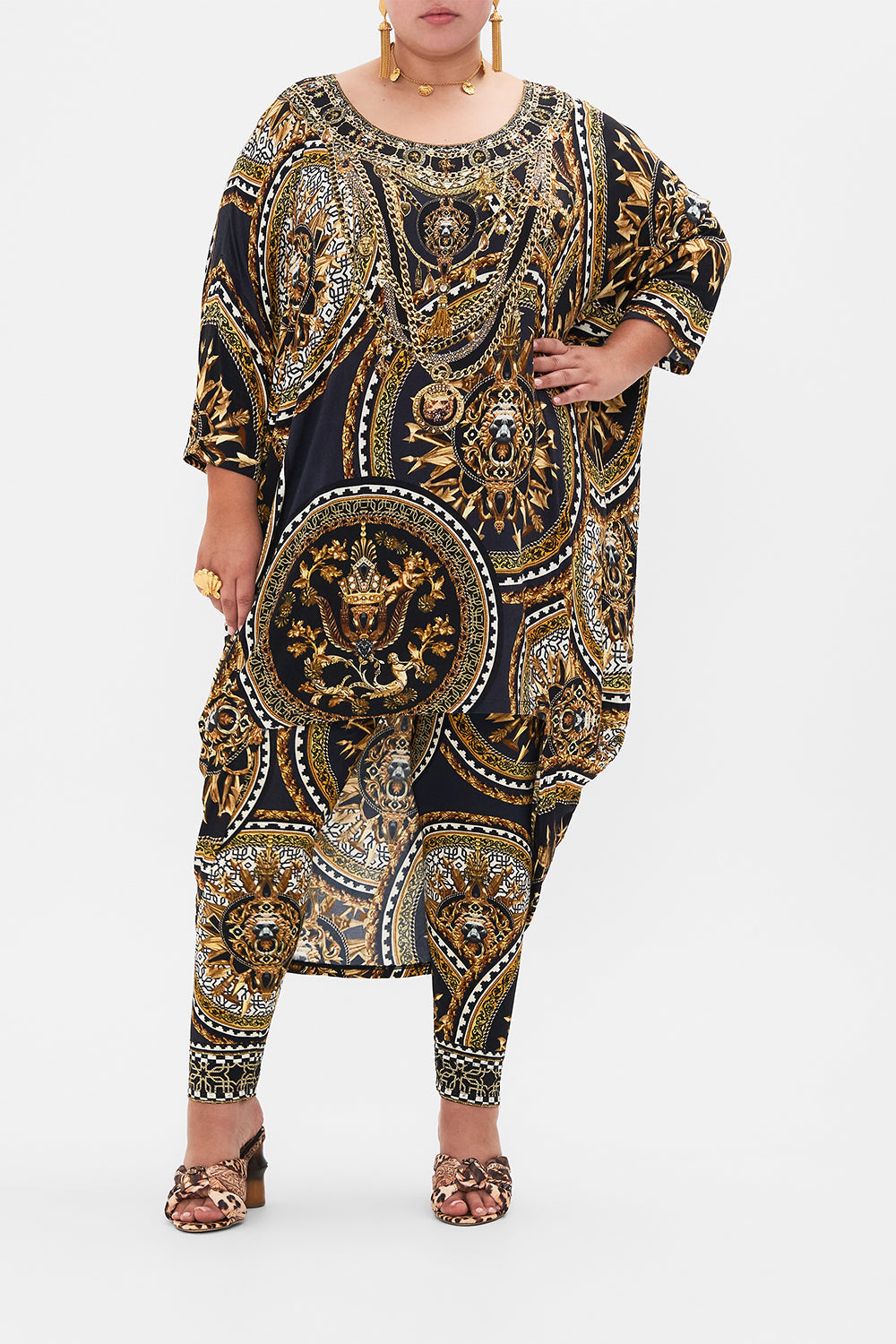 Front view of curvy model wearing CAMILLA plus size leggings in Duomo Kaleido print
