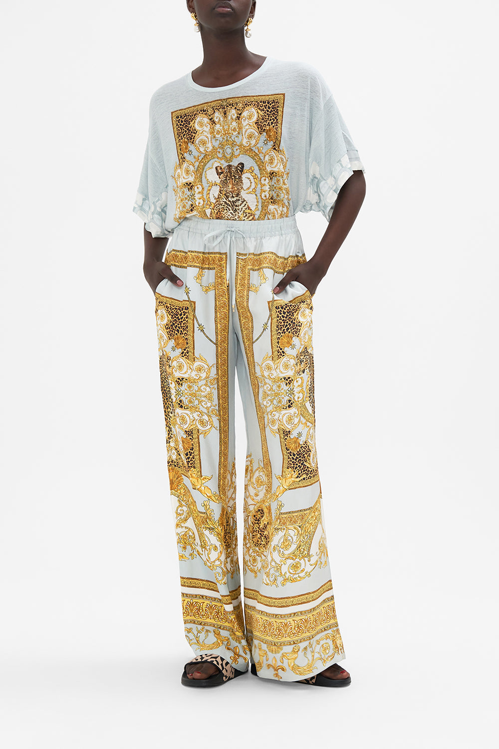Front view of model wearing CAMILLA silk wide leg pant in Palazzo Pride print