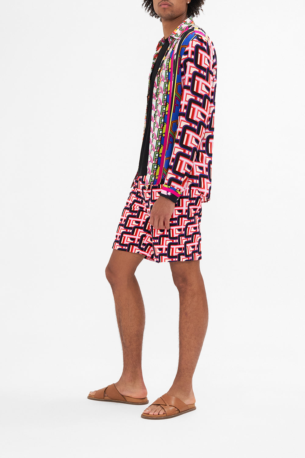 Side view of model wearing HOTEL FRANKS BY CAMILLA long sleeve shirt in Rome Retro print