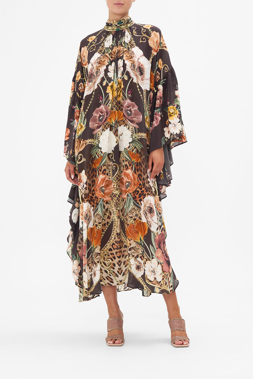 Front view of model wearing CAMILLA silk floral kaftan in Wave Your Wand print