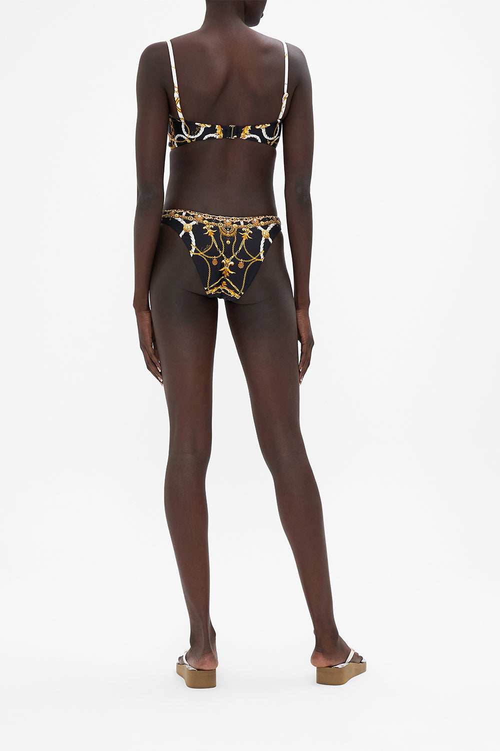 Back view of model wearing CAMILLA silk pants in Coast to Coast print