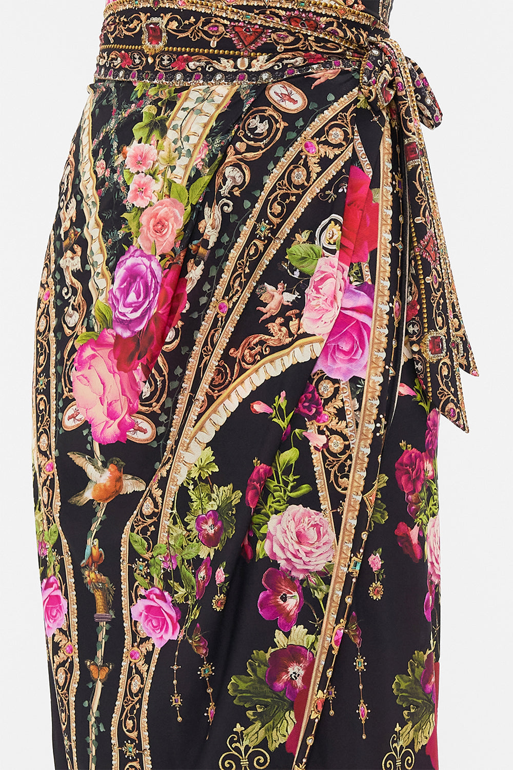 Detail view of model wearing CAMILLA resortwear draped sarong in Reseravtion For Love print