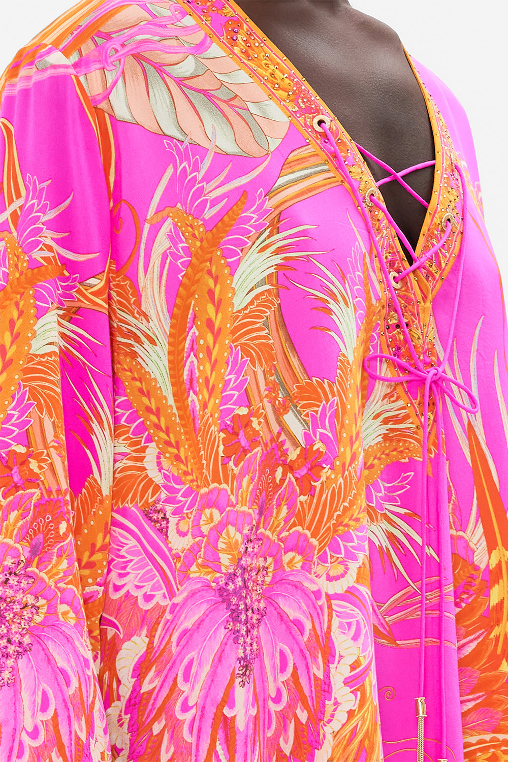 Detail view of model wearing CAMILLA designer kaftan in A Heart That Flutters print