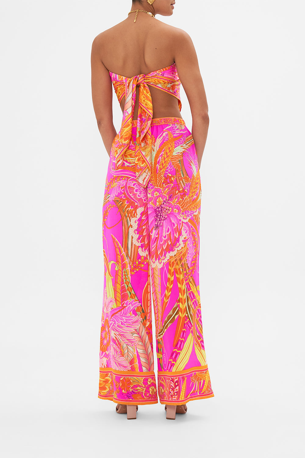 Back view of model wearing CAMILLA silk wide leg pant in A Heart That Flutters print