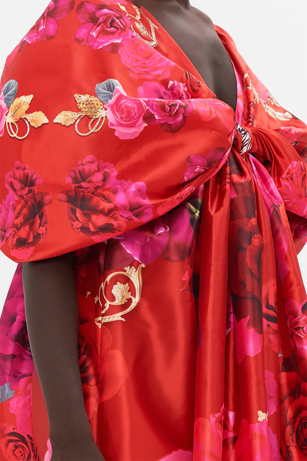 Detail view of model wearing CAMILLA taffeta maxi dress with bow detail in An Italian Rosa print