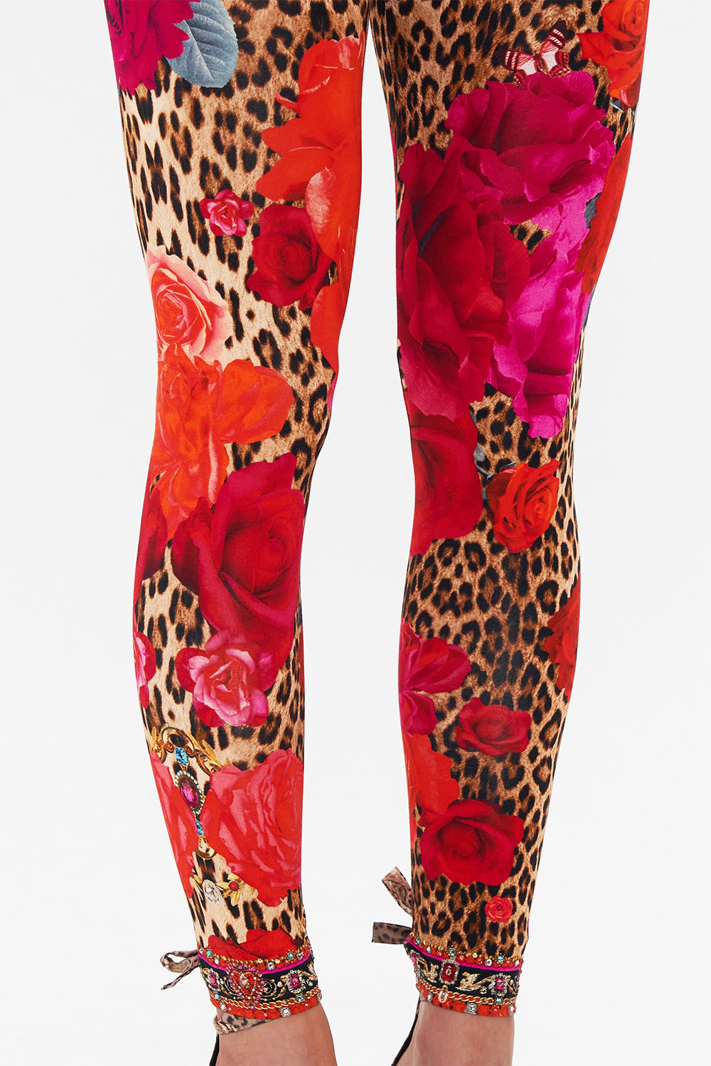Detail view of model wearing CAMILLA designer leggings in Heart Like A Wildflower print