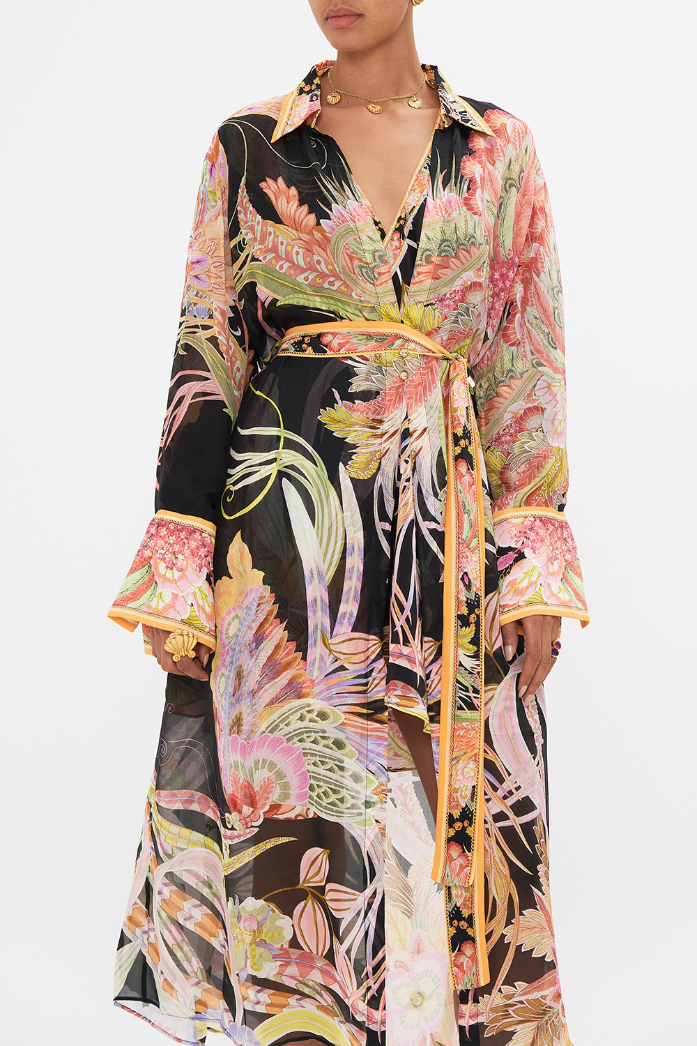 Detail view of model wearing CAMILLA silk kimonop layer in Lady of the Moon print