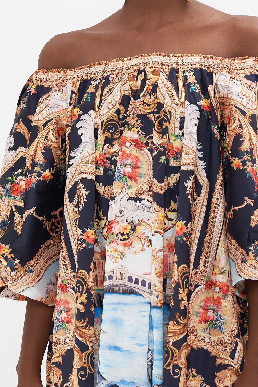 Detail view of model wearing CAMILLA off the shoulder mini dress in Venice Vignette print