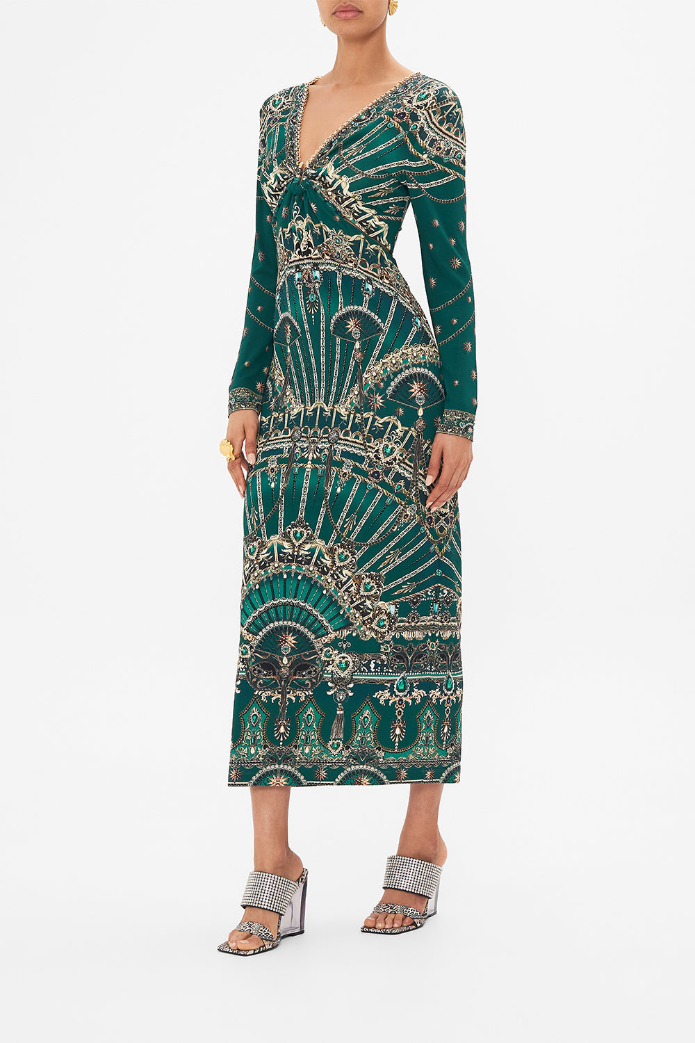 Side view of model wearing CAMILLA cut out green jersey dress in A Venice Veil print