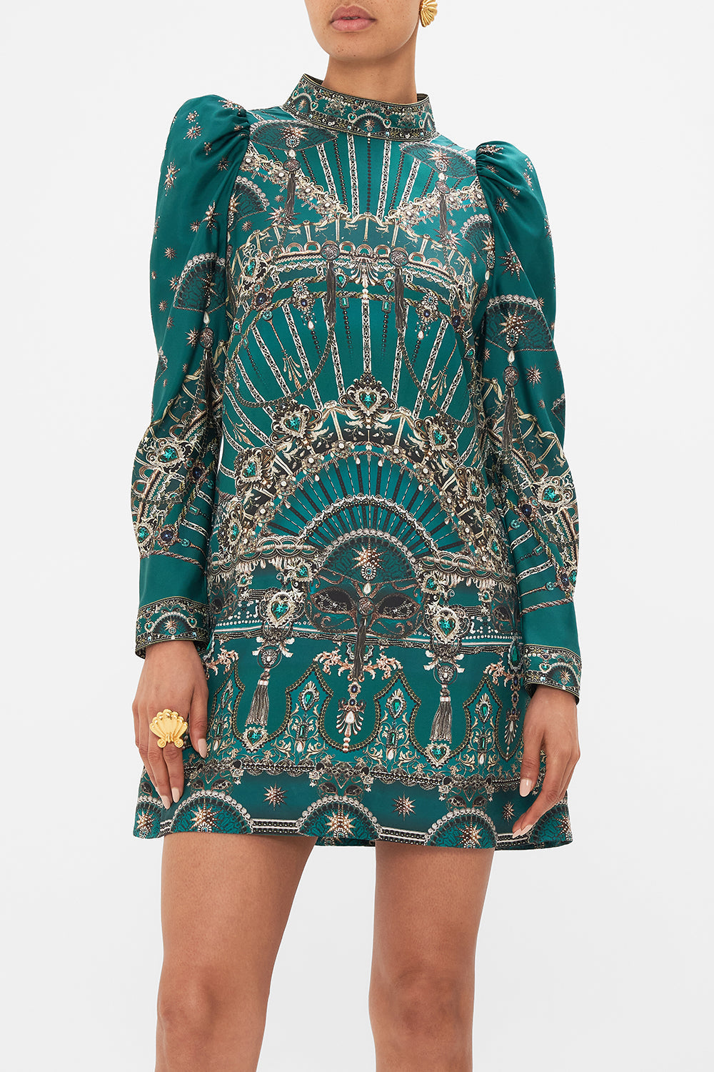 Crop view of model wearing CAMILLA puff sleeve high neck mini green dress in A Venice Veil print