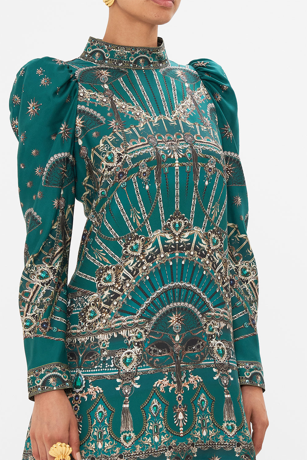 Detail view of model wearing CAMILLA puff sleeve high neck mini green dress in A Venice Veil print