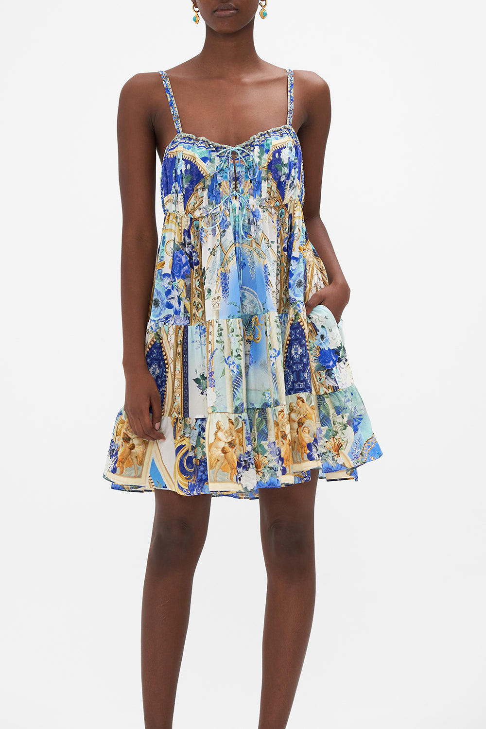 Crop view of model wearing CAMILLA designer mini dress in Views Of Vesuvius Print