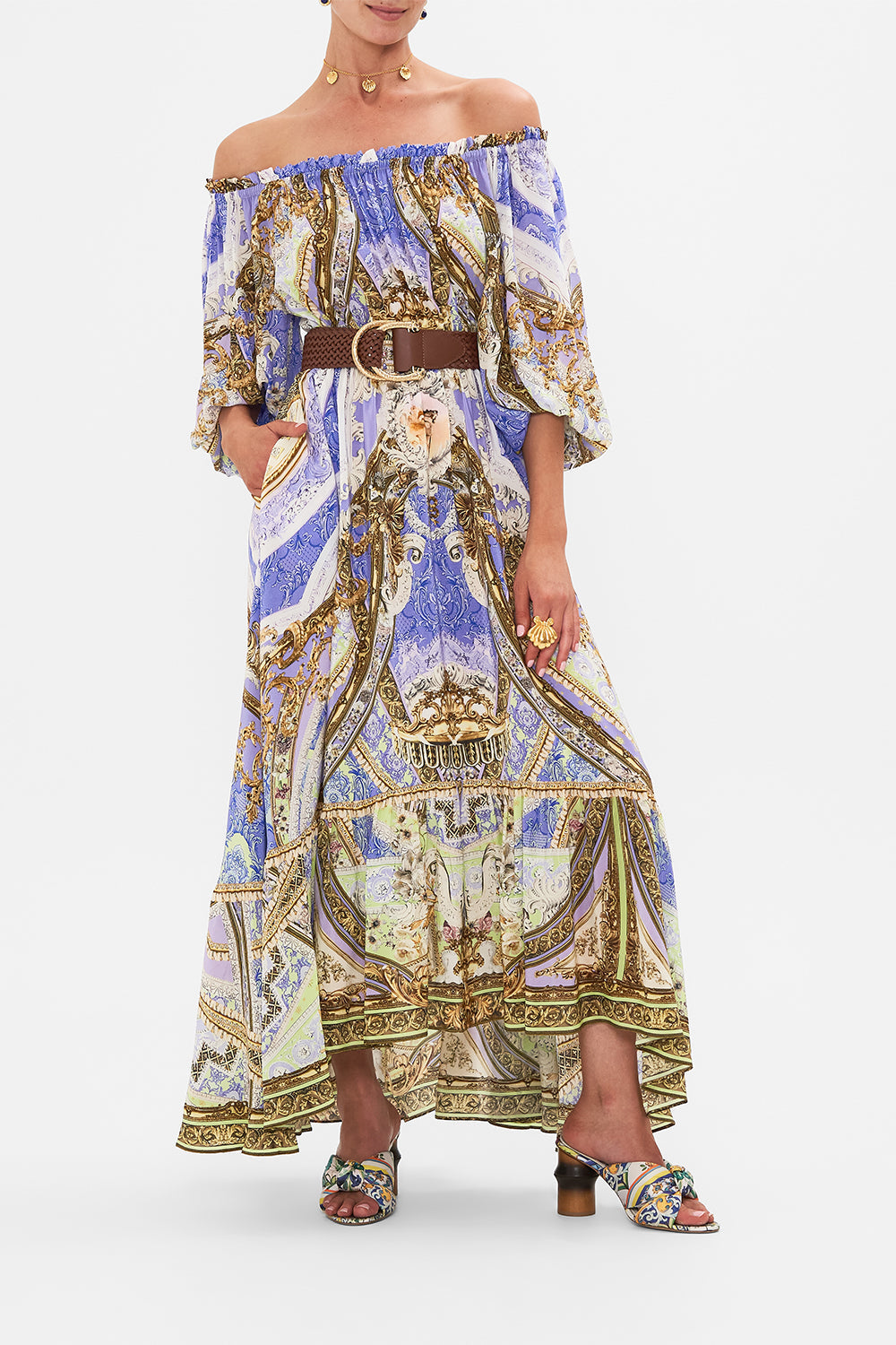 Crop view of model wearing CAMILLA frill off the shoulder dress in Guilded Pleasures print