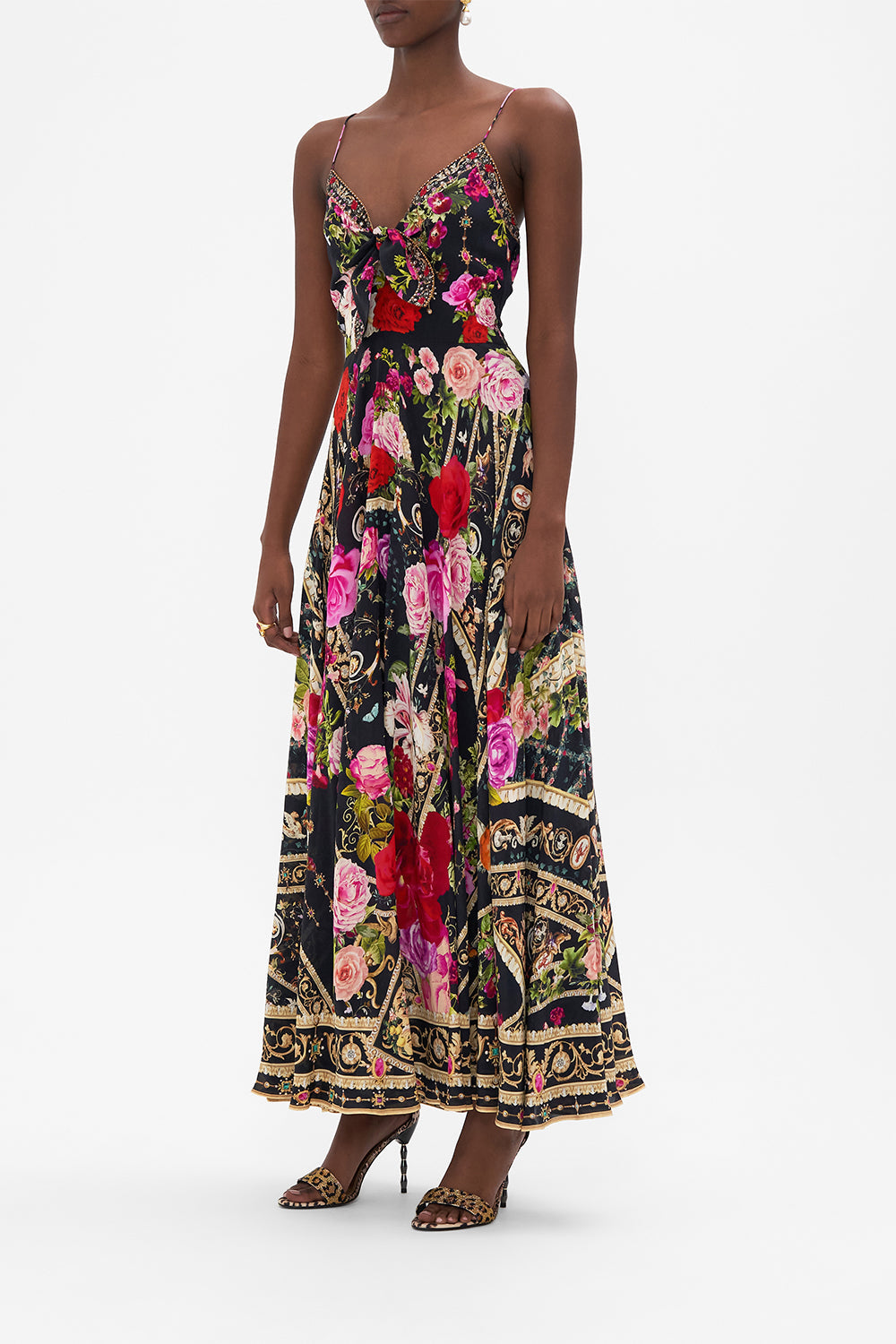 Side view of model wearing CAMILLA floral silk maxi dress in Reservation For Love print