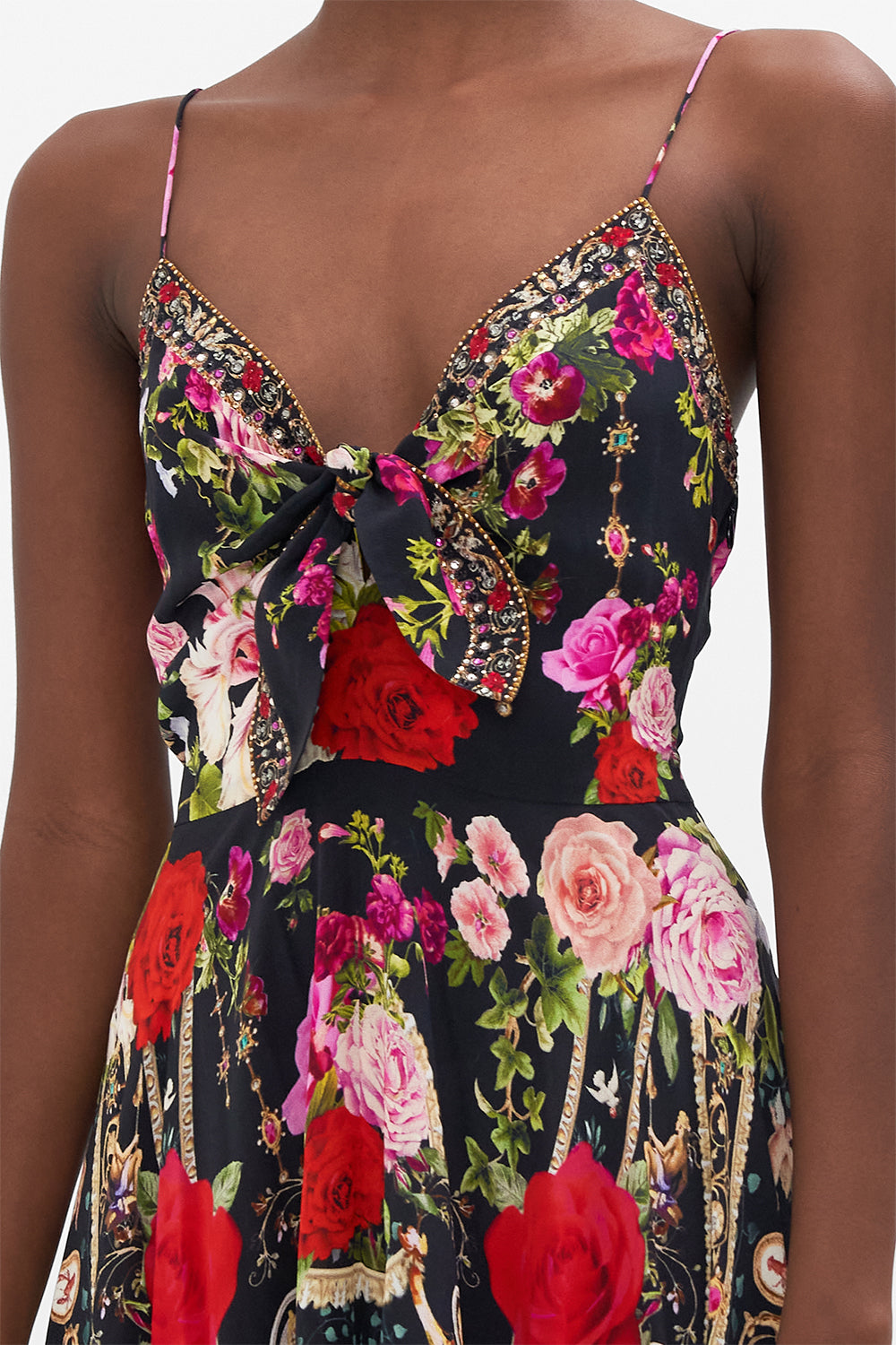 Detail view of model wearing CAMILLA floral silk maxi dress in Reservation For Love print