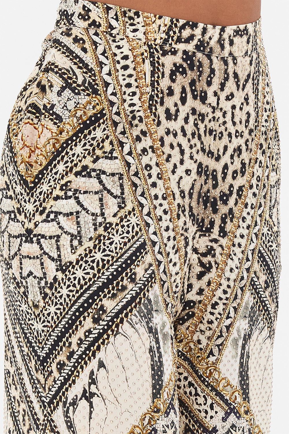 Detail view of model wearing CAMILLA silk animal print pants in Mosaic Muse