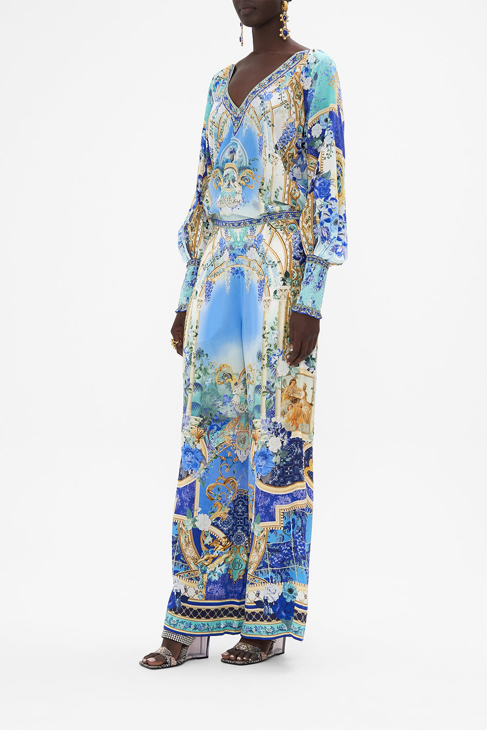 Side view of model wearing CAMILLA silk blouse in Views Of Vesuvius print