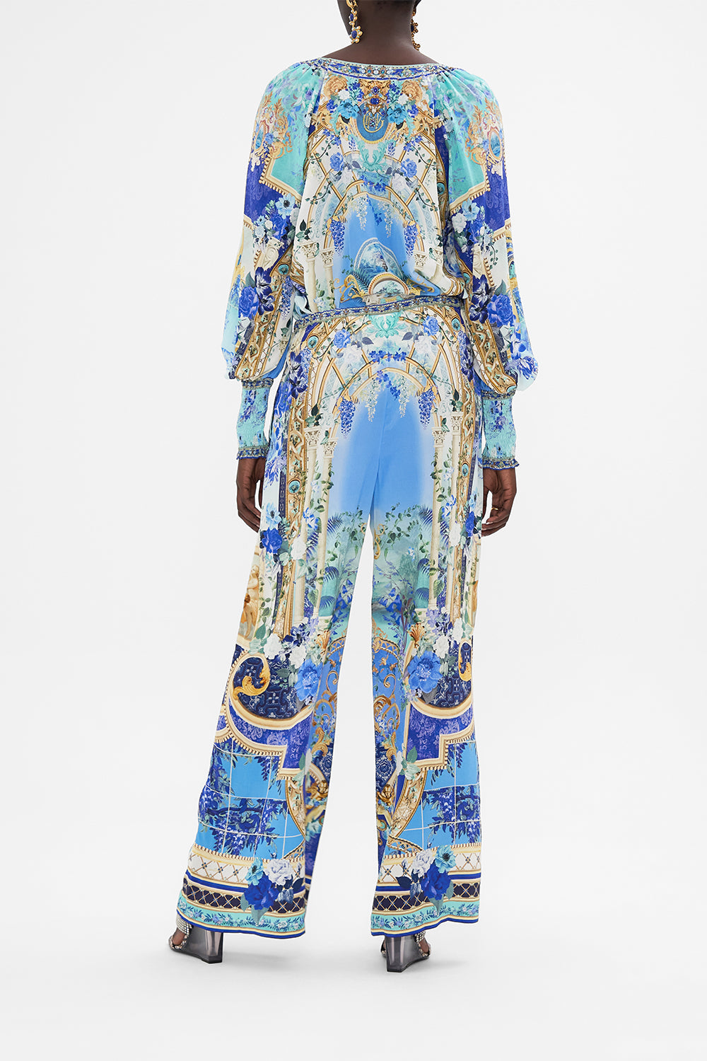 Back view of model wearing CAMILLA silk blouse in Views Of Vesuvius print