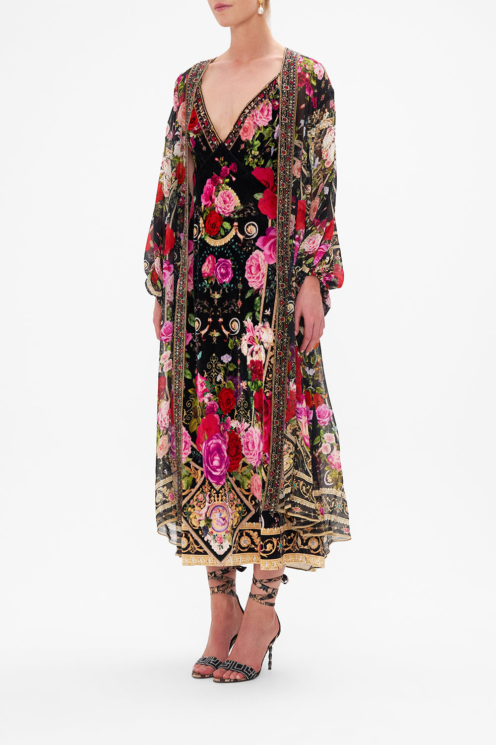 Side view of model wearing CAMILLA silk kimono layer in Reservation For Love print