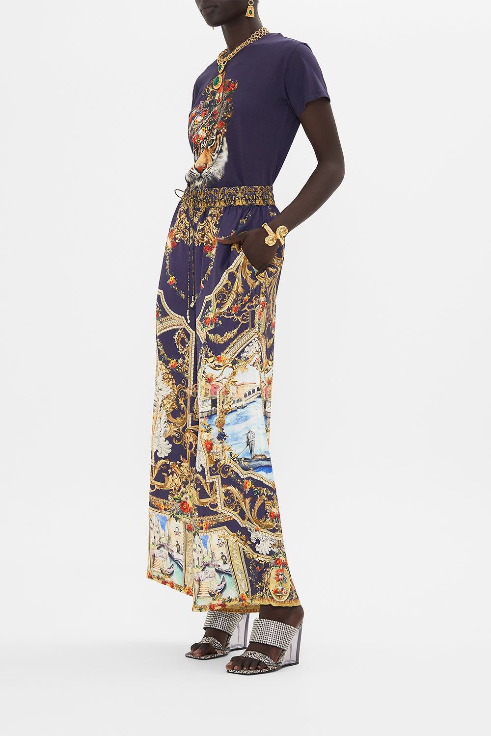 Side view of model wearing CAMILLA womens t shirt in Venice Vignette print