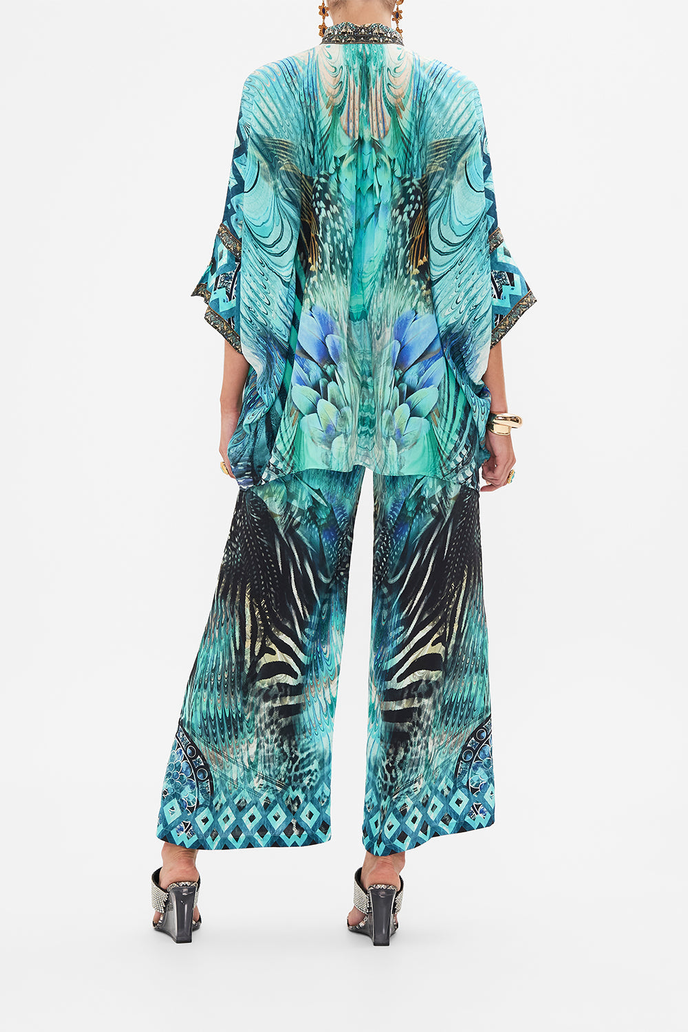 Back view of model wearing CAMILLA silk shirt in Azure Allure print