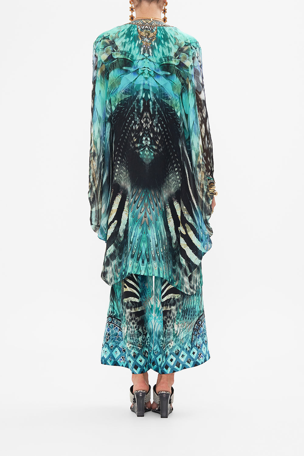 Back view of model wearing CAMILLA silk kimono layer in Azure Allure print