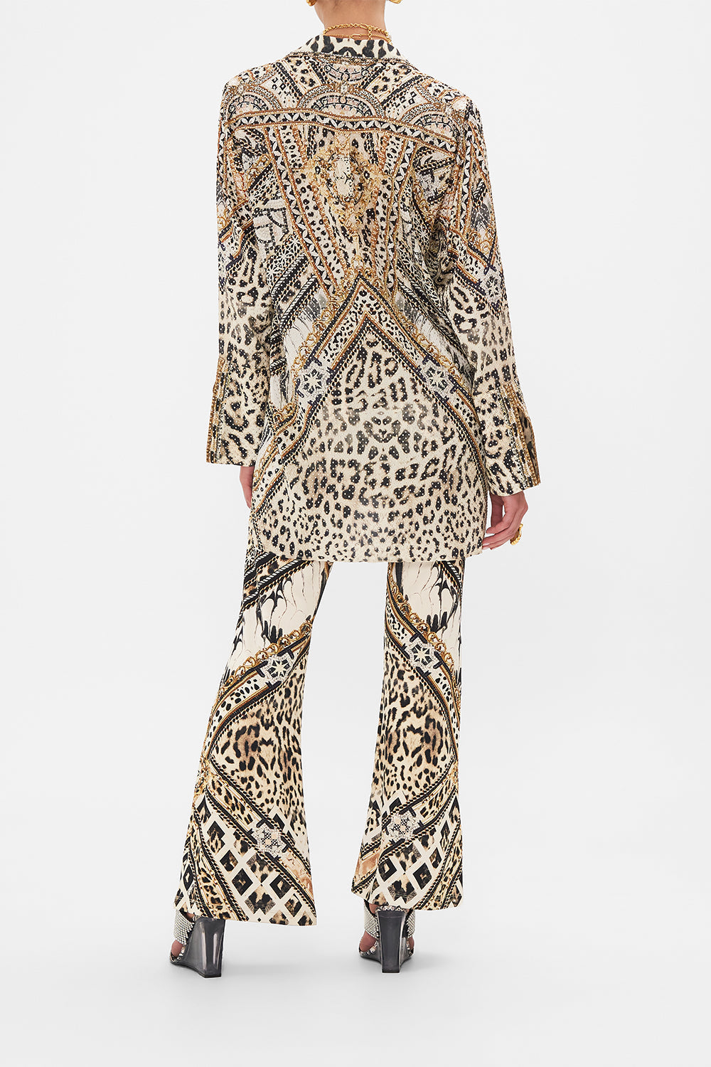 Back view of model wearing CAMILLA silk coat in Mosaic Muse print