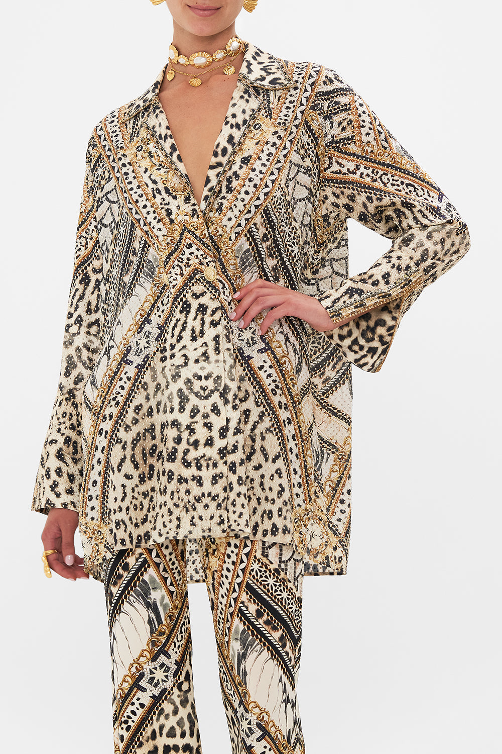 Crop view of model wearing CAMILLA silk coat in Mosaic Muse print