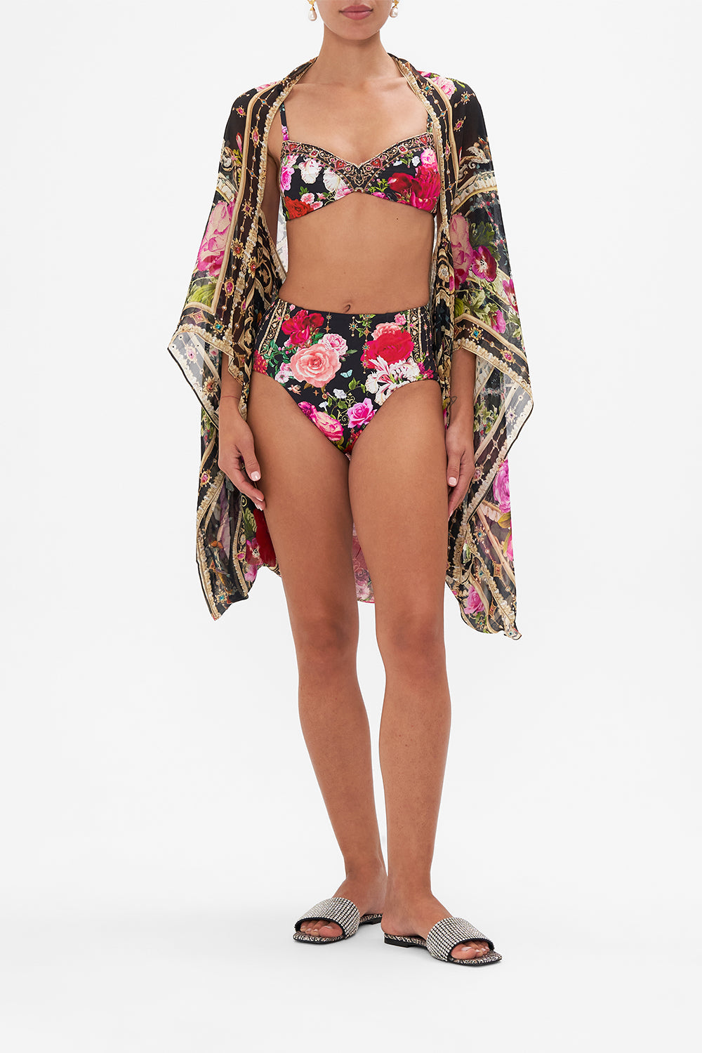 Front view of model wearing CAMILLA floral silk shrug in Reservation for Love print