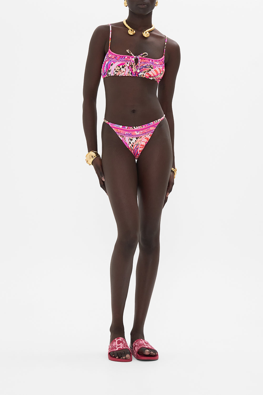 Front view of model wearing CAMILLA resortwear bikini bottom in Viola Vintage print