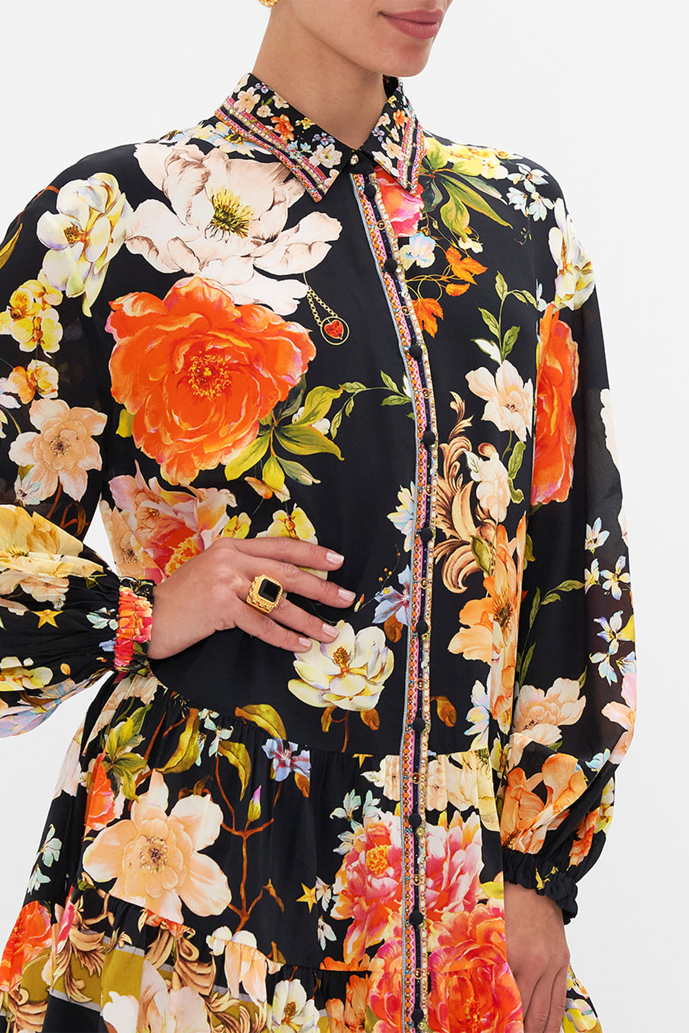 Detail view of model wearing CAMILLA floral silk shirdress in Secret History print