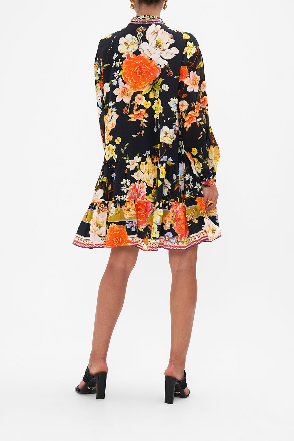 Back view of model wearing CAMILLA floral silk shirdress in Secret History print